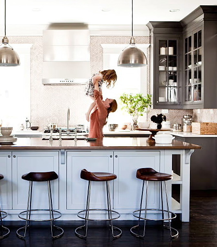 California Flats LLC of Ventura County family's values shown with kitchen view with a smiling mother embracing a child the child